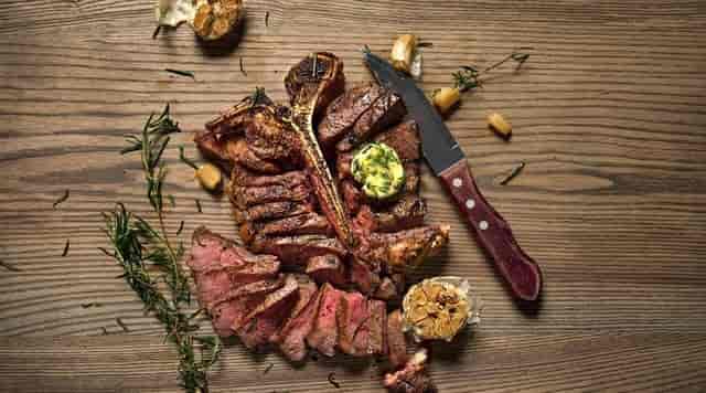 Chef-driven plated entrée at a Bedrock restaurant for gala dinners and VIP luncheons.