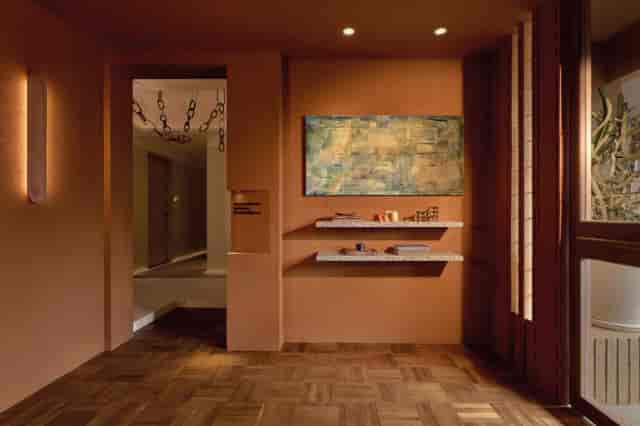 Upscale lounge foyer with moody lighting for premium boardroom and corporate networking events.