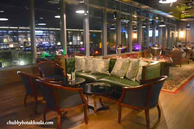 Gastropub lounge at Cook & Brew with club seating for networking events and VIP breakout sessions.