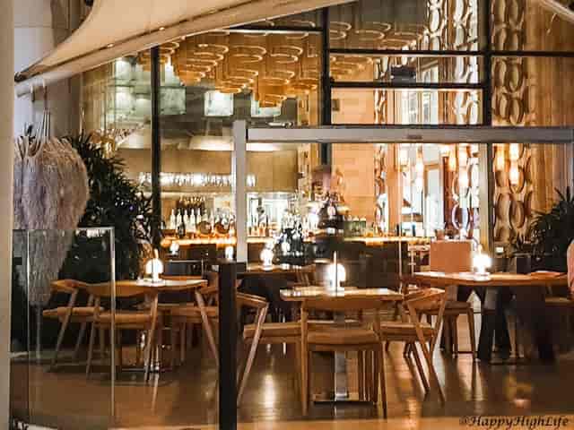 Private dining room with warm ambient lighting for upscale incentive dinners and networking events.