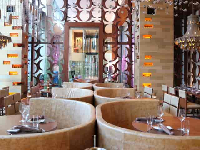 Semi-private dining area at SKIRT restaurant, perfect for executive lunches and networking events.