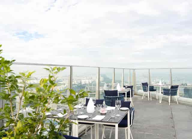 Stellar Restaurant rooftop venue with modern seating for VIP dinners and corporate networking.