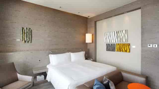 Contemporary Grand Ballroom guest room for executive conference VIPs.