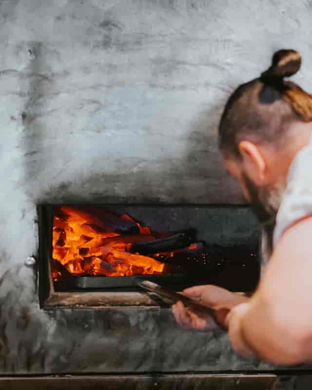 Kaarla wood-fire grill catering for rustic outdoor incentive dinners and experiential events.