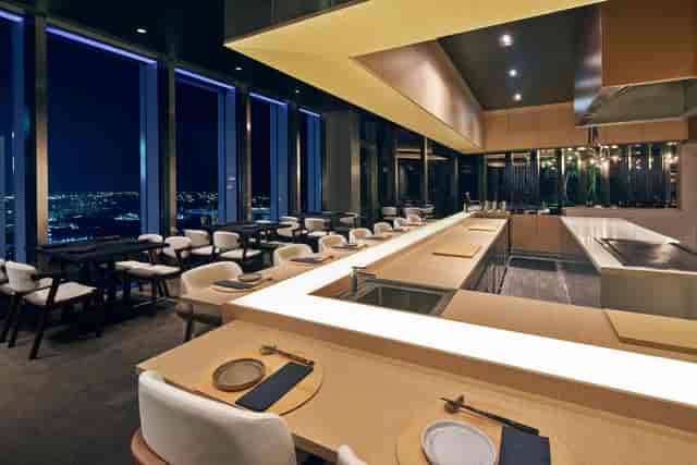 Oumi 1-Arden sophisticated counter-seating for VIP dinner and corporate event venue.
