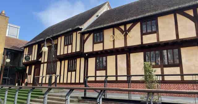 Onyx restaurant with historic aesthetic, ideal for corporate dinners and off-site events.