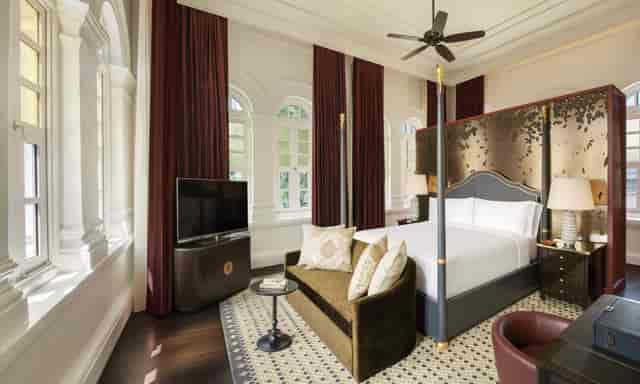 Raffles Room VIP suite featuring colonial decor for executive meetings and corporate hospitality.