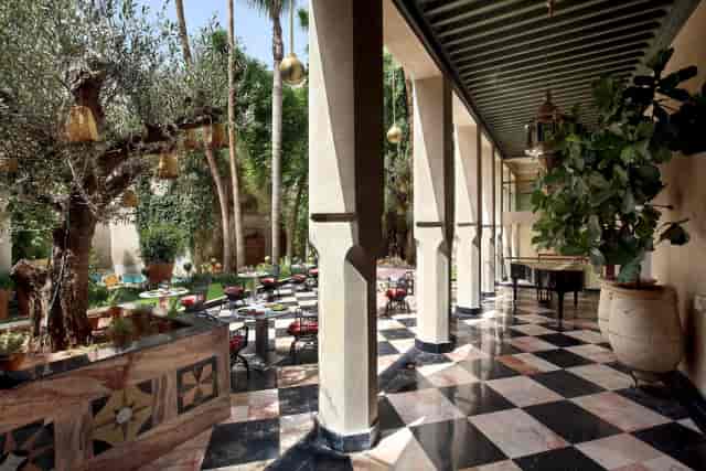 El Fenn courtyard with checkerboard floors for luxury corporate reception and gala dinner events.
