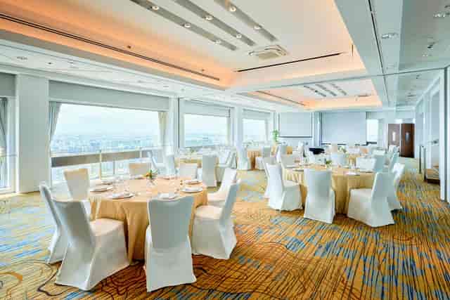 Elegant Stamford Ballroom with round tables, ideal for corporate meetings and formal banquets.