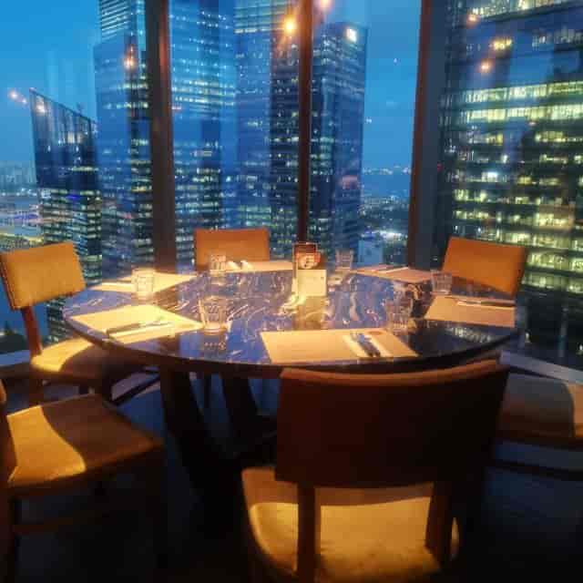 Sophisticated dining setup at Cook & Brew, ideal for exclusive events and networking.