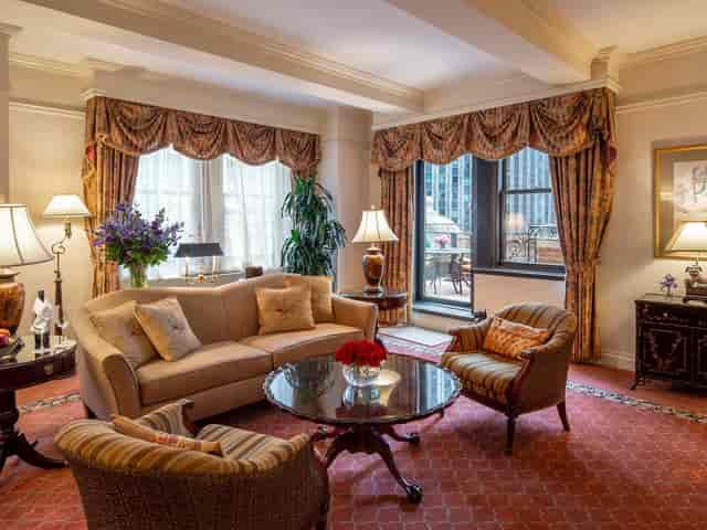Luxury VIP suite with elegant decor for executive meetings and professional event green rooms.