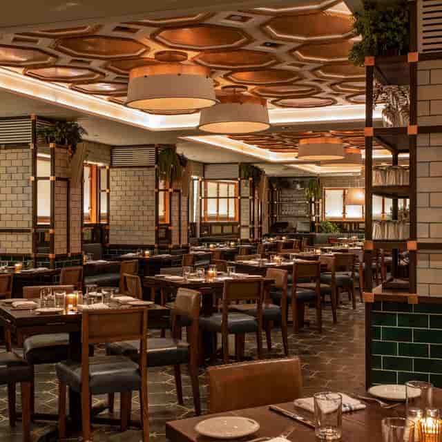 Legasea Bar & Grill with ambient lighting, ideal for corporate dinners and networking events.