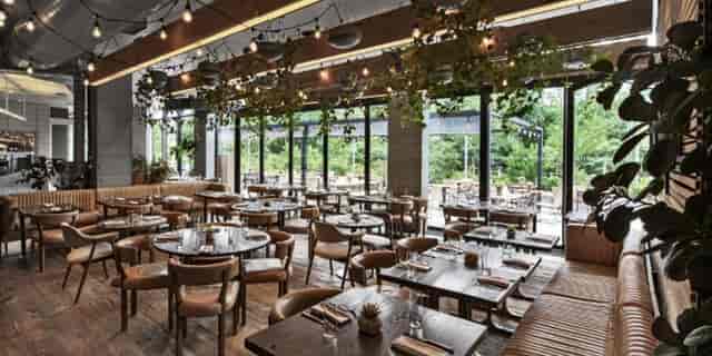1 Hotel Brooklyn Bridge restaurant for corporate dinner and networking events with ambient lighting.