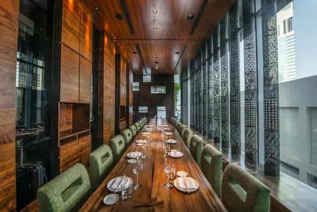 Long-table private dining at Wabi Sabi Zuma Dubai for executive dinners and boardroom meetings.