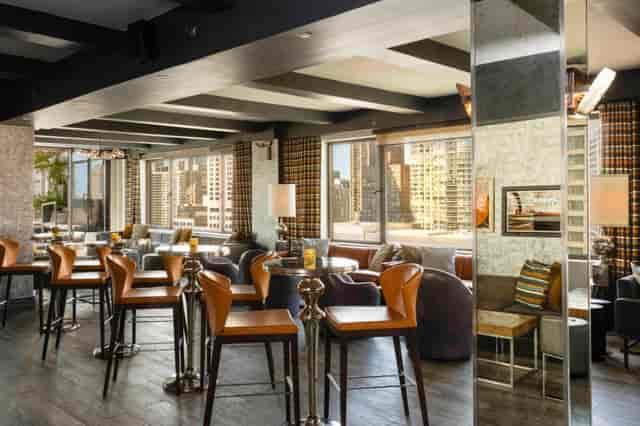 Upscale lounge at The Empire Hotel with city views, perfect for cocktail receptions and networking.