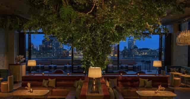 Luxury rooftop garden with biophilic design for corporate networking events in NYC.