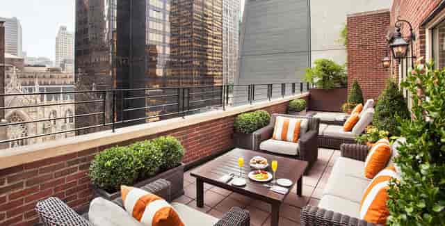 Omni Berkshire Place suite: elegant urban breakout space for NYC VIP networking and board meetings.