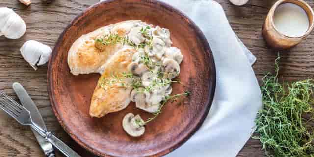 Rustic roasted chicken with creamy mushroom sauce for Marina Del Rey catering lunch event.