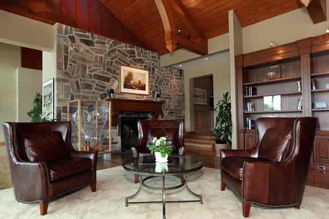 Kingbridge Centre breakout room with fireplace for executive retreats and VIP networking.