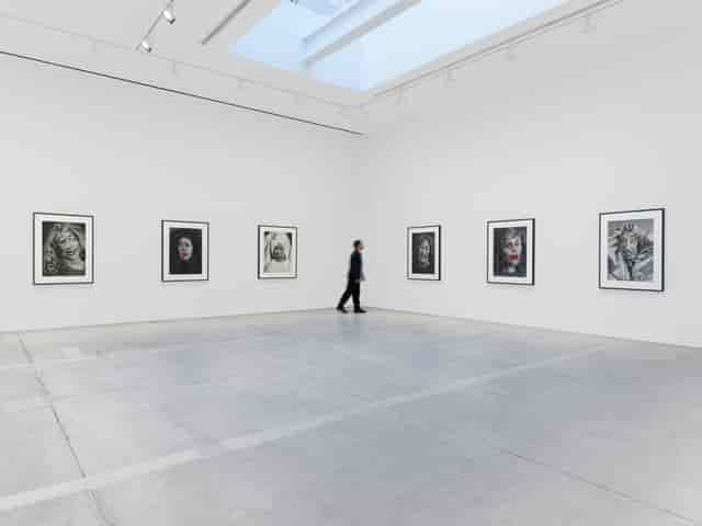 Minimalist Hauser & Wirth art gallery, high-ceiling venue for corporate events and receptions.