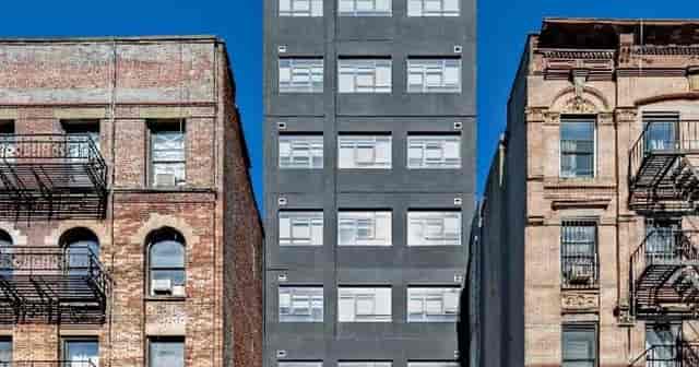 Rooftop terrace at Orchard Street Hotel: modern venue with brownstone views for stylish events.