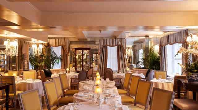 Pembroke Room banquet space set for an intimate corporate luncheon or VIP dinner.