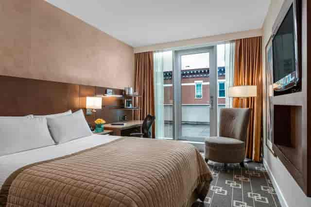 Executive board room at Wyndham Garden Chinatown with ergonomic workspace for business events.