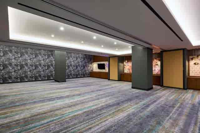 Modern Renaissance Harlem meeting room for corporate receptions and professional breakout sessions.