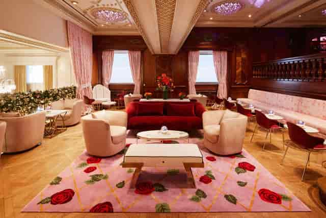 Rose Club lounge with plush seating, ideal for VIP cocktail receptions and networking events.