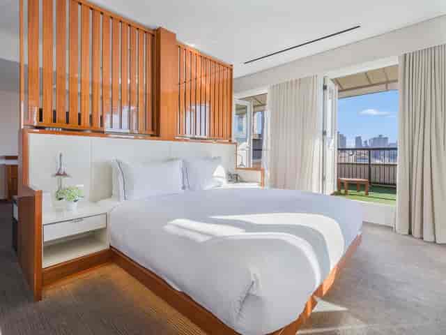 Luxury hotel suite at 33 Hotel NYC Seaport with skyline balcony for VIP meetings and events.