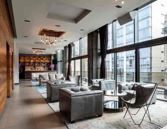 Park Lounge: Contemporary networking venue with floor-to-ceiling windows for VIP receptions.