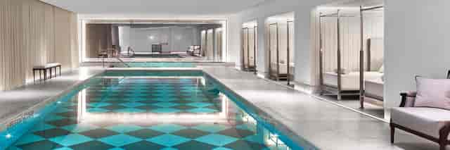 Luxury Baccarat Hotel suite, sleek wellness facility for VIP receptions and incentive trips.