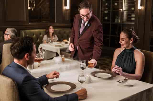 Upscale private dining room at Bull & Bear for corporate incentive dinners and client events.