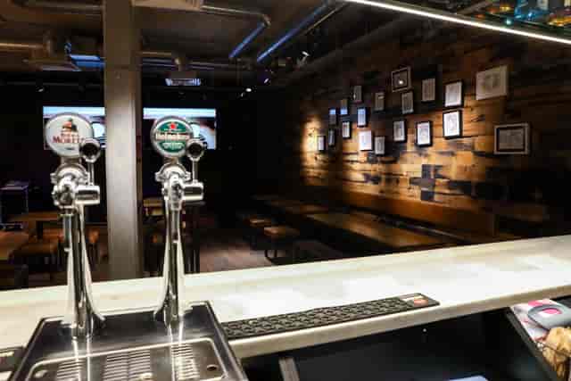 Pilpel's basement bar venue with rustic decor, ideal for evening reception and networking events.