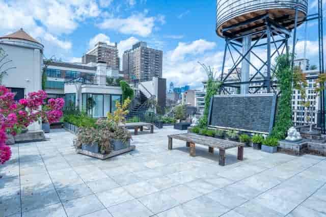 Industrial-chic rooftop venue at Triangle Loft for cocktail receptions and corporate events.