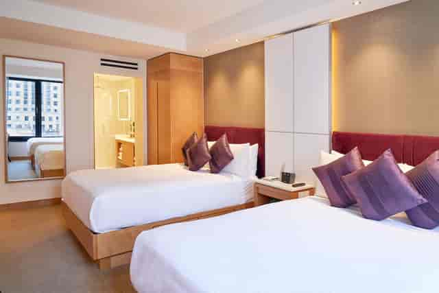 Modern double hotel room with terrace, ideal for corporate conferences and business events.