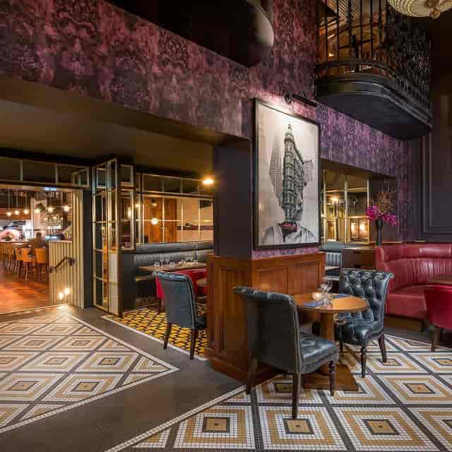 Moody high-end NoLita restaurant for intimate networking and executive dinners.