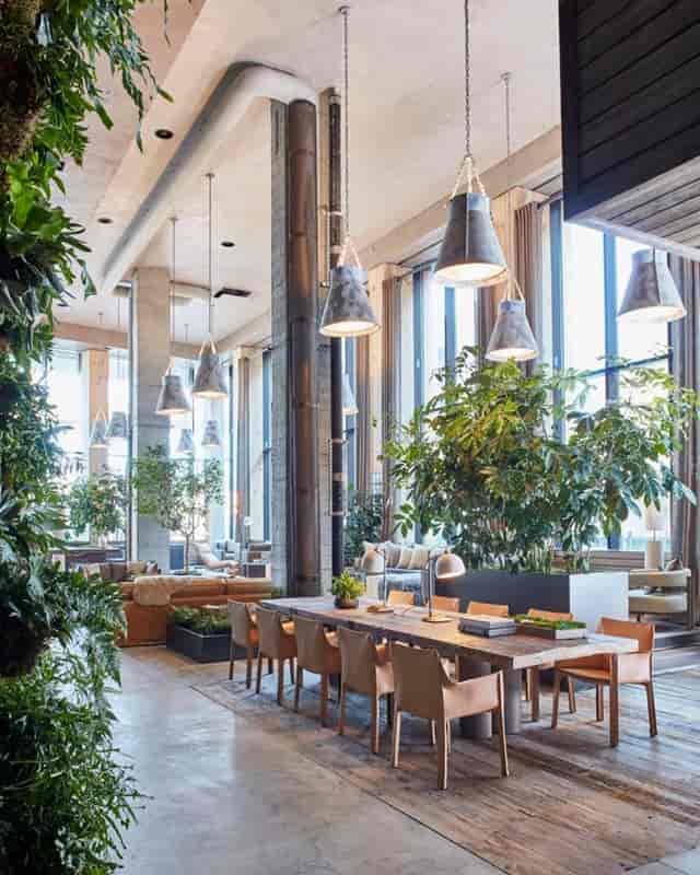 High-end biophilic Reservoir room at 1 Hotel Central Park for executive networking and meetings.