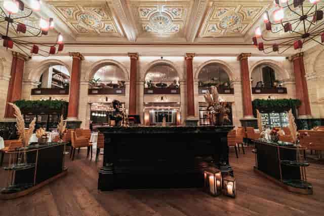 Elegant venue hire in Piazza Italiana, featuring ornate ceilings for upscale events.