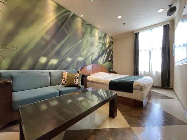 Shinden hotel room at Riviera Tokyo with breakout space for business meetings and remote work.