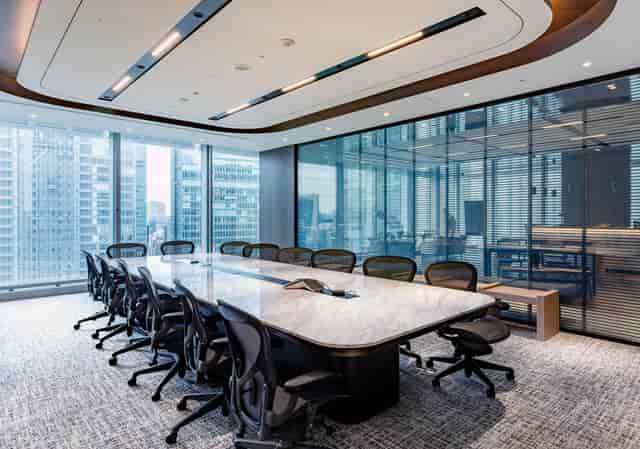 Executive boardroom at JP Tower Hall with marble table for corporate meetings and conferences.