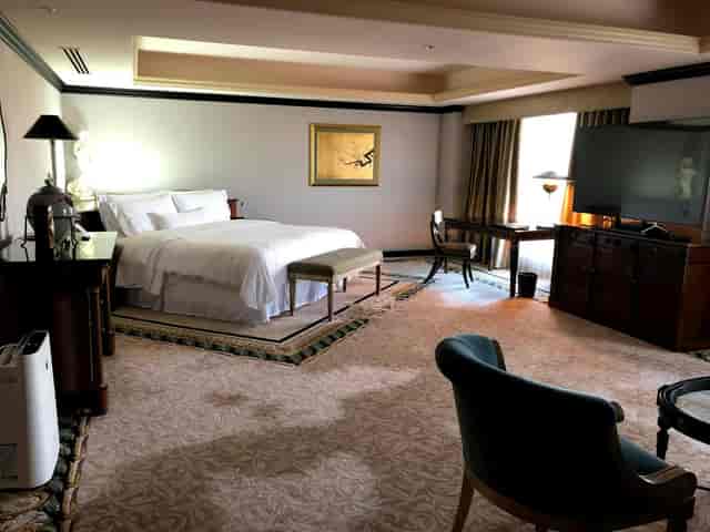 Luxury Westin Tokyo hospitality suite with executive workspace for VIP business meetings and events.