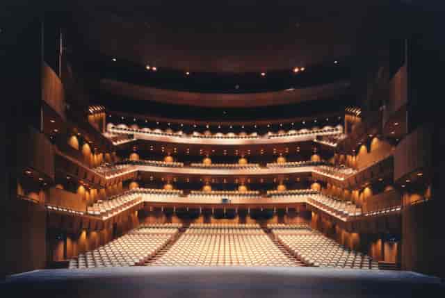 Experimental Theatre auditorium with multi-tiered seating for professional keynotes and events.