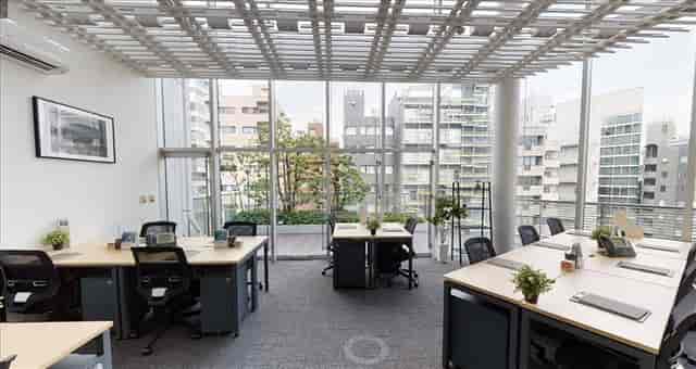 Modern coworking space at Garden Terrace, Ichigo Ebisu with floor-to-ceiling windows for events.