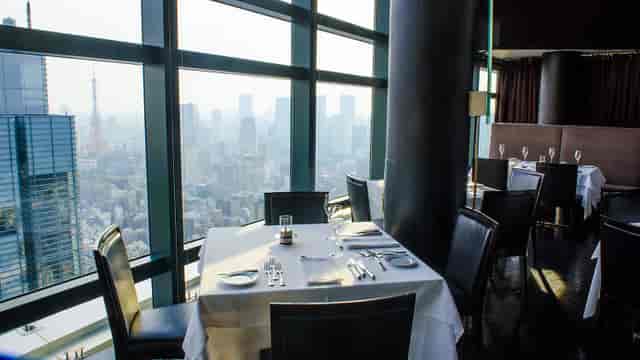 Luxury Tokyo skyline view restaurant for VIP corporate dinners and board meetings.