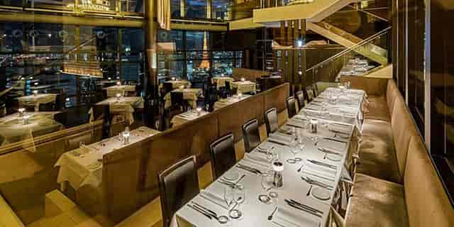 Upscale Fish Bank TOKYO restaurant with communal seating for corporate dinner and event venue.