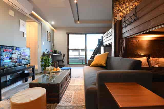Tokyo Hub Room Amethyst: loft-style hospitality suite for business meetings and small events.