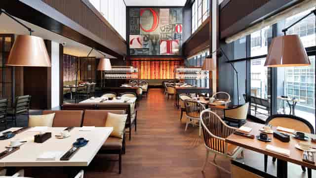Sophisticated NAMIKI667 lounge with dramatic lighting for corporate dinners and VIP events.