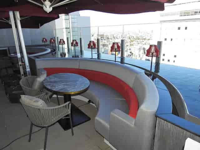 BAO by CÉ LA VI Tokyo: Rooftop venue with circular booths for VIP receptions and networking.