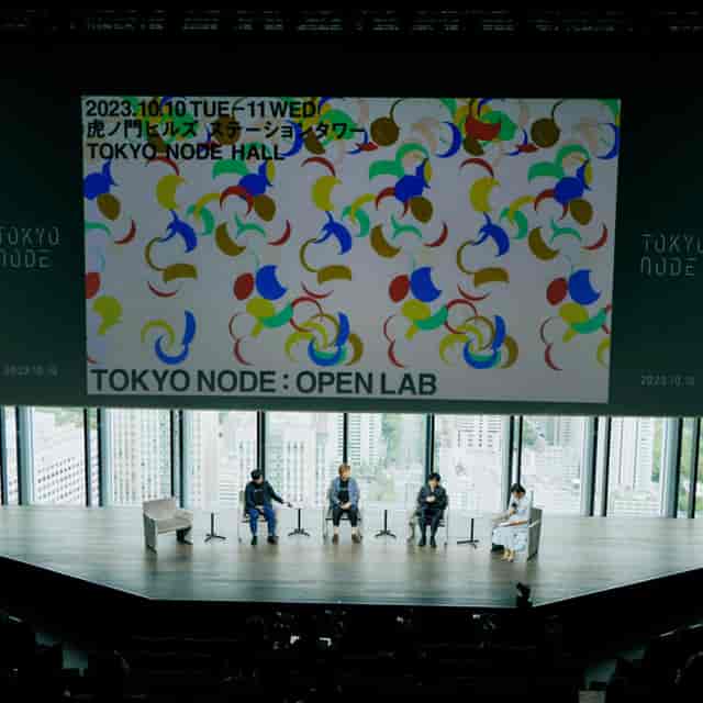 Modern Tokyo Node stage with panoramic city view, ideal for corporate events and tech conferences.